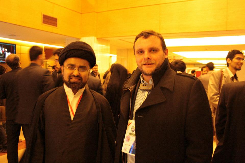 with a Shiite cleric at the Teheran conference in 2012